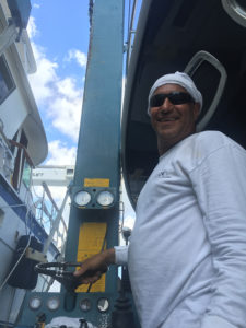 Travel lift operator at the CAY Marine Boatyard Miami